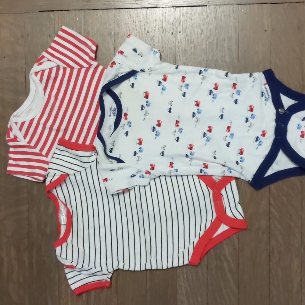 Black, red, and white onesies